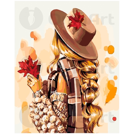 Tyttö vaahteranlehdellä