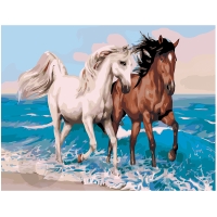 Hevoset meren rannalla