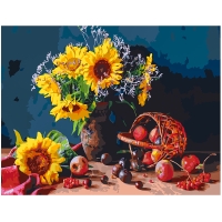 Saulespuķes uz galda