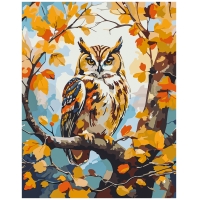 Owl in autumn leaves